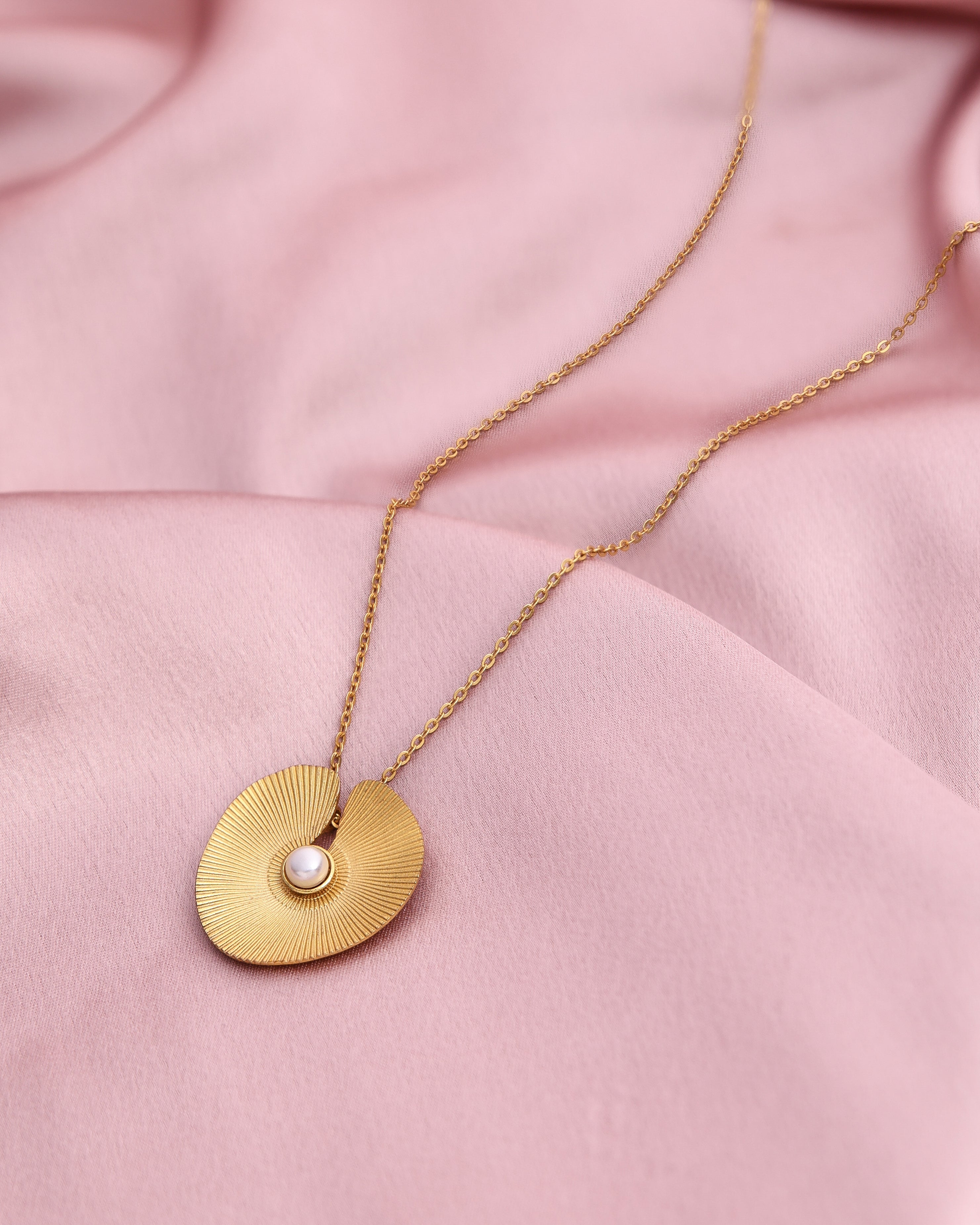 Lotus leaf gold tone pendant