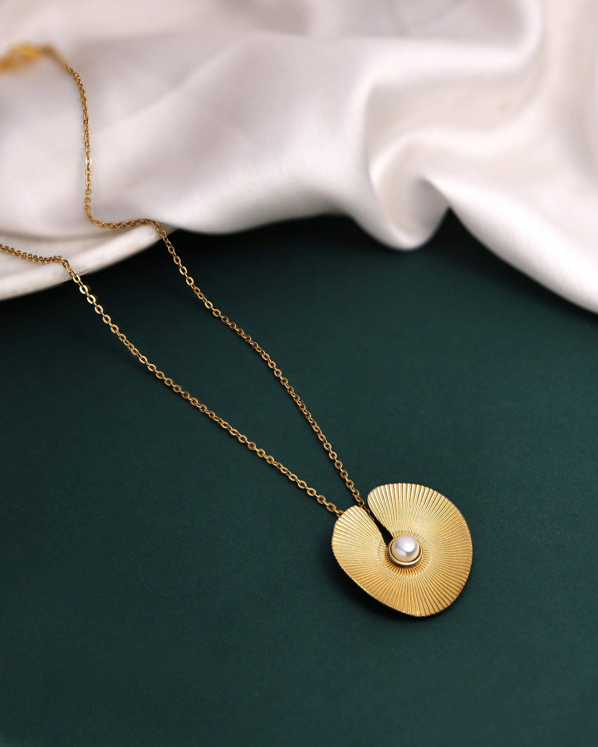 Lotus leaf gold tone pendant