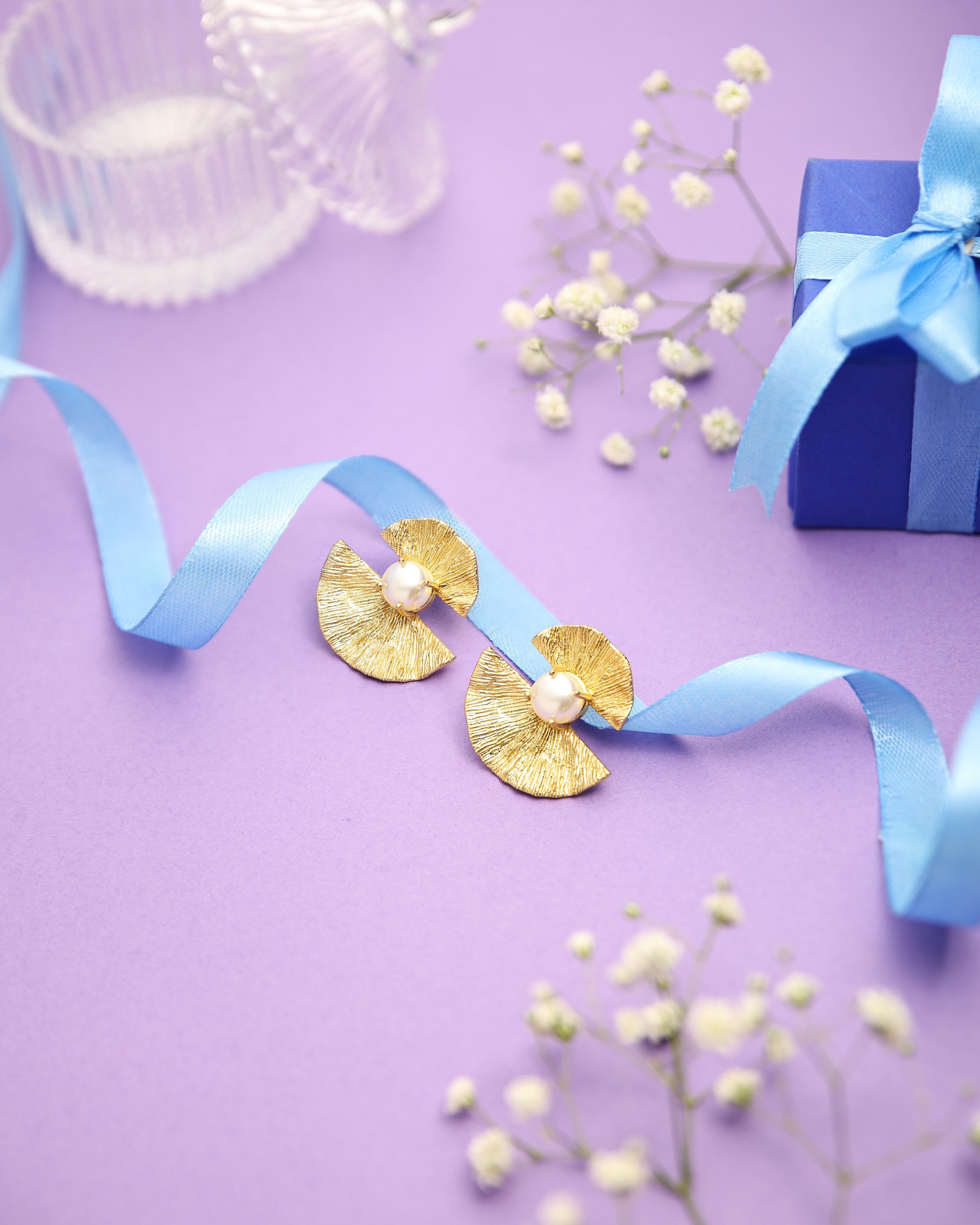 Pearl Studded Textured Bow Earrings