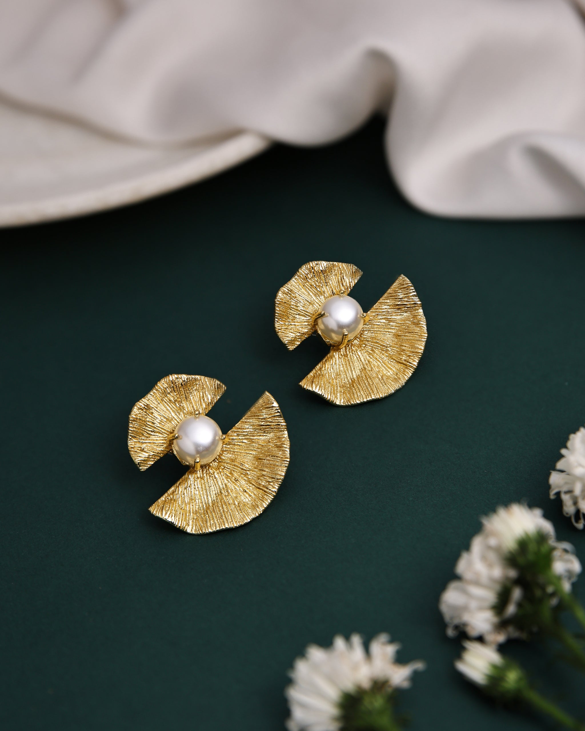 Pearl Studded Textured Bow Earrings