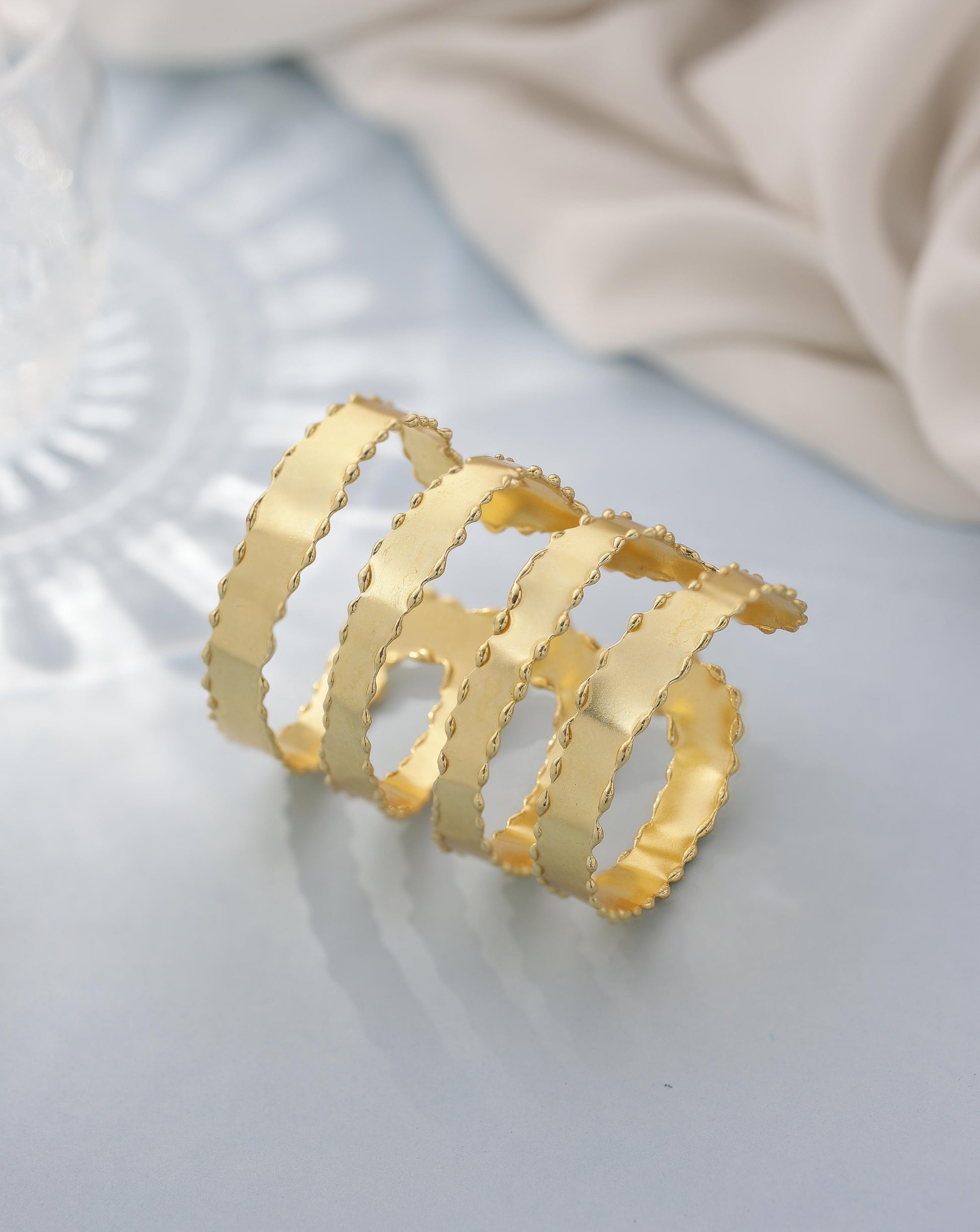 Spiral long shimmery handcuff bracelet