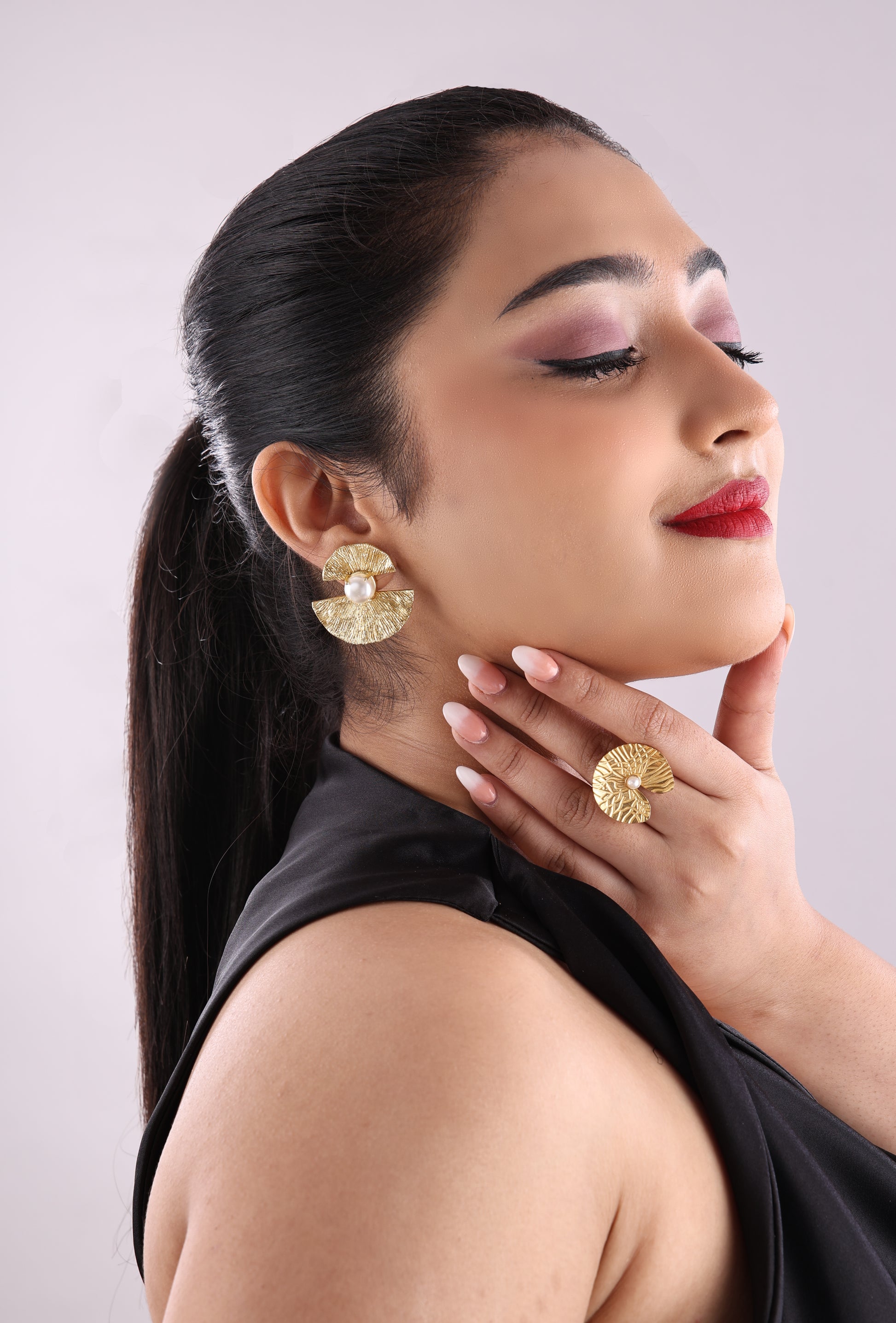 Pearl Studded Textured Bow Earrings