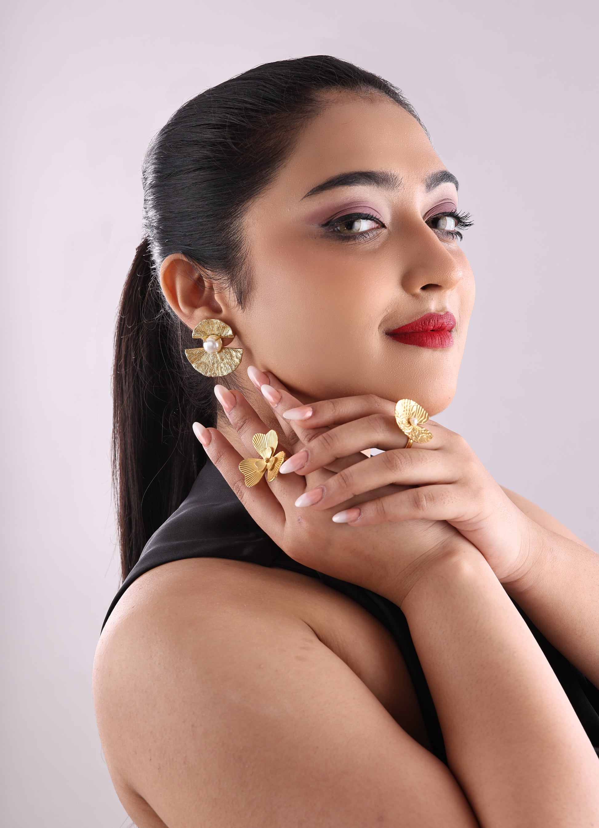 Pearl Studded Textured Bow Earrings