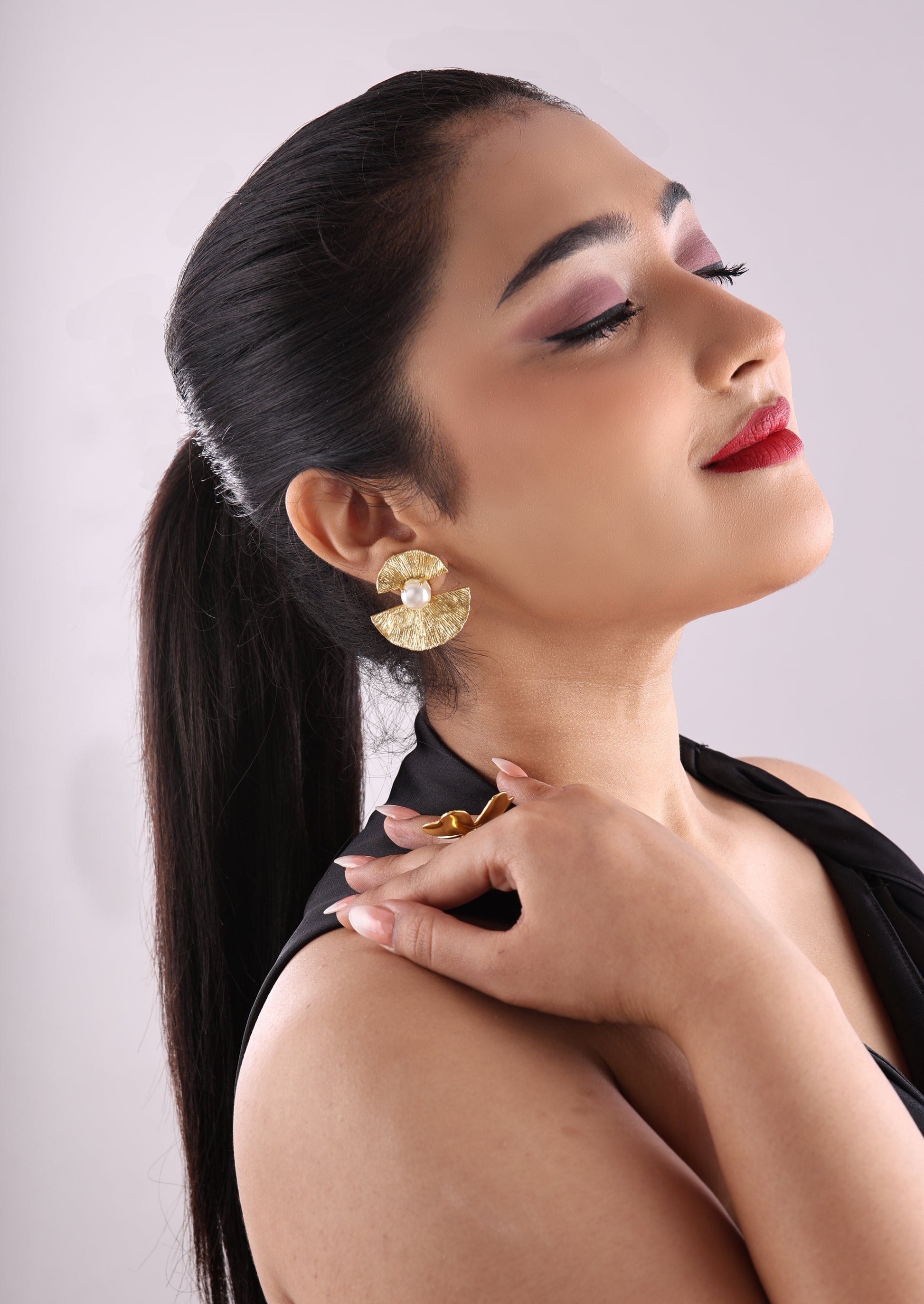 Pearl Studded Textured Bow Earrings