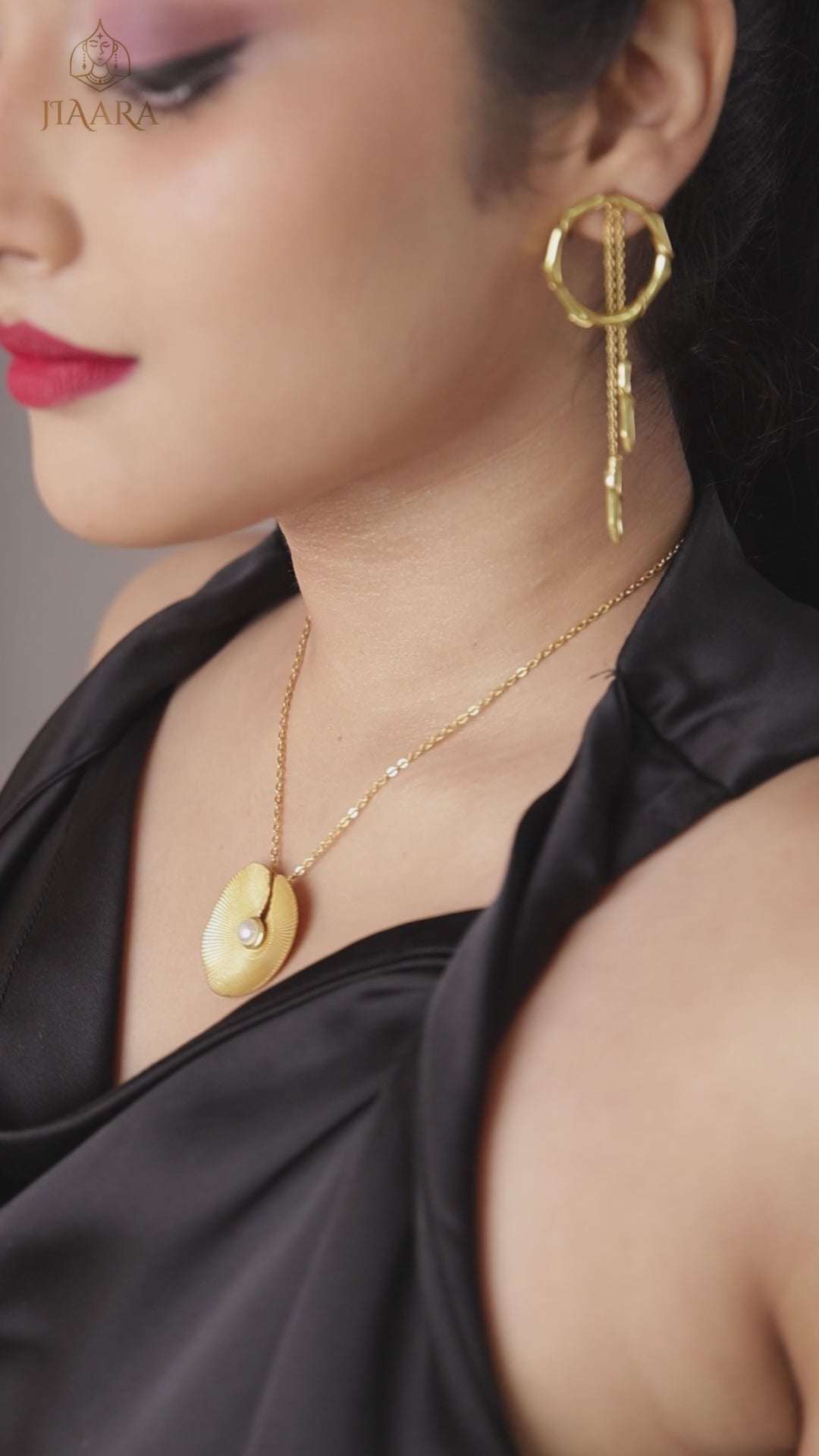 Lotus leaf gold tone pendant